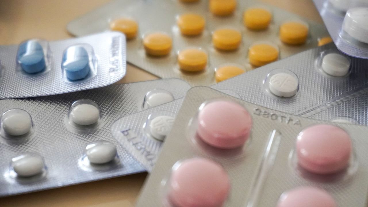 Assorted medication blister packs, close up