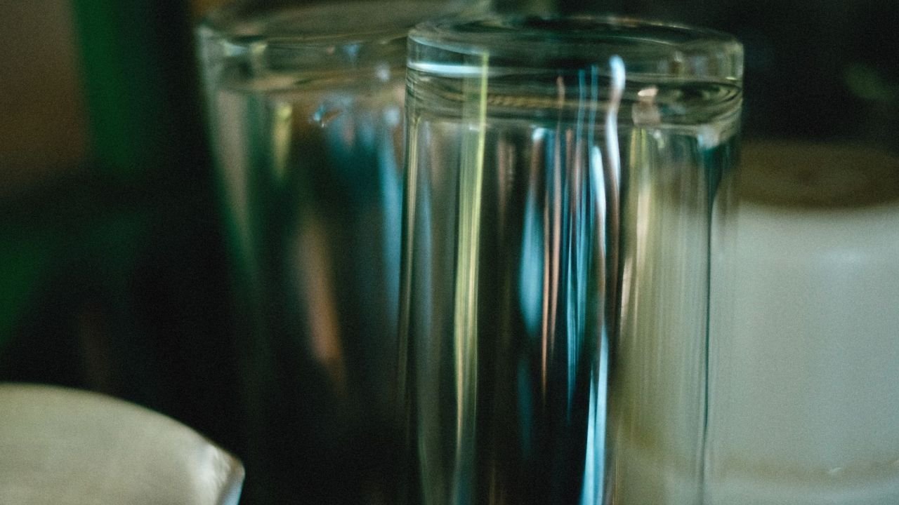 Two glasses of water side by side, close up